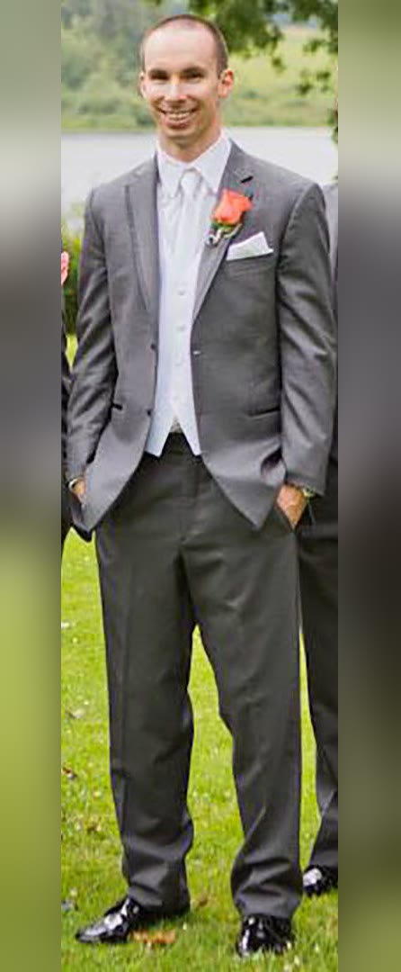 The same man in an off-the-rack rental suit